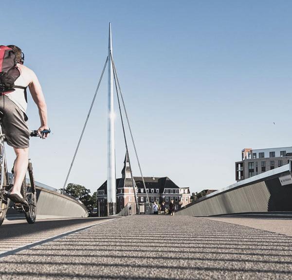 Cyclist on the City Bridge